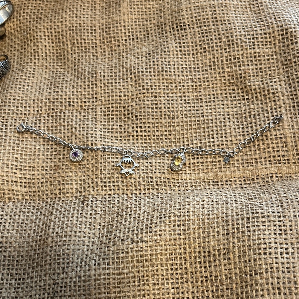 Elegant Silver Bracelet with Purple and Yellow Accents